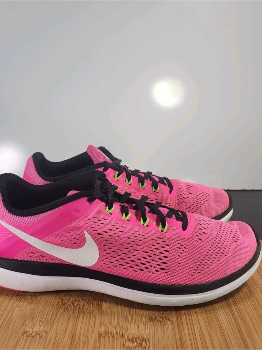 Nike Women’s Pink and Black Athletic Running Shoes with White Swoosh